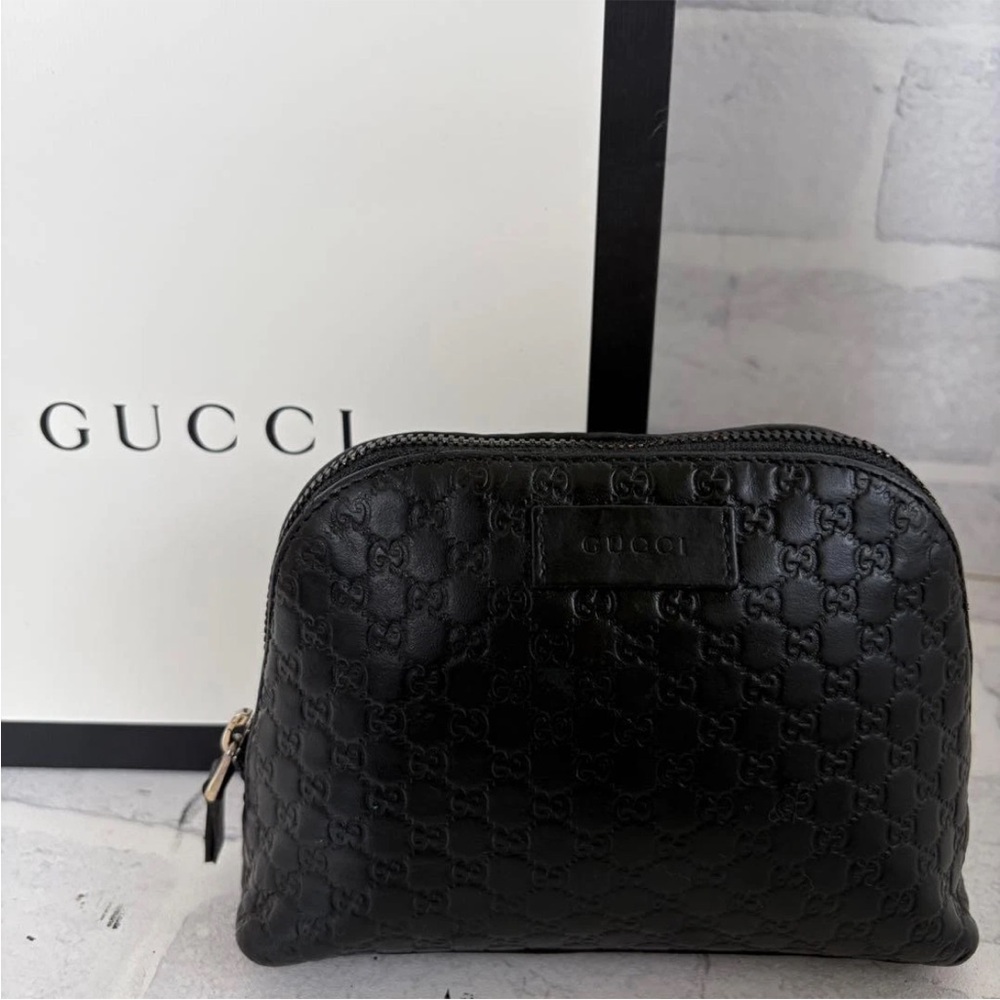 Gucci Embossed Black Leather Clutch - Picture 1 of 9